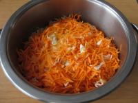 Peel a carrot, wash it and grate into thin long...