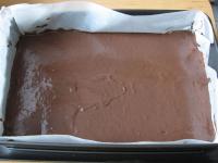 Pour the dark dough and spread evenly on the...