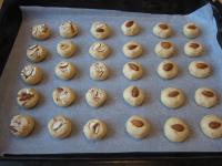 Knead the dough and shape balls out of it, into...