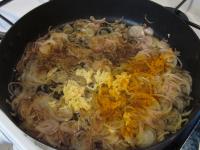 ... turmeric and add peeled, grated garlic. Mix....