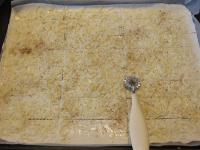 Grate the cheese and sprinkle the dough, add salt,...