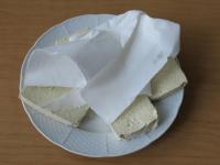 Cut the tofu into slices about 1 cm thick and...