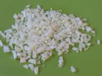 Clean the onion and cut it finely....
