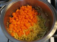 Add carrots to the vegetables, and then stir and...