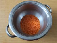 Put the lentils into a pot and wash with water....