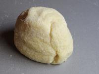 Add one egg, semolina and a pinch of salt. Knead...