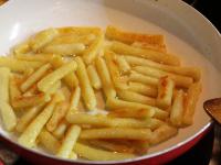 Fry the cooked dumplings in butter until golden....