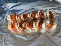 Skewer the meat, onion, pepper and mushrooms...