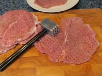 Pound 4 slices of veal as thinly as possible...