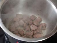 Fry the meat in oil in a hot pot....