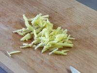 Cut ginger finely ......