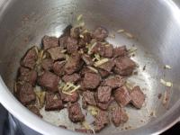 ... and add to the meat. Pour a little water as...