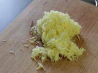 Grate the potatoes finely, ......