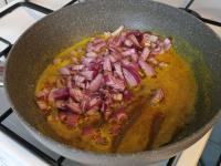 Add the onion and fry briefly....