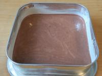 Pour the dough into a form (25x25 cm) greased with...