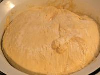 Knead the dough so that it sticks off the walls of...