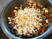 Stir crushed tofu into cooled vegetables and...