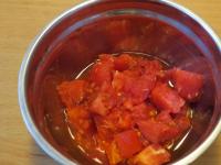 Pour hot water over the tomatoes, let rest for a...
