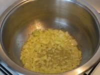 Peel and cut the onion and fry it in butter....