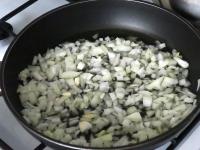 Peel and cut the onion and fry it in fat....