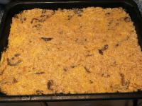Spread the mixture on a well-greased baking sheet...