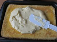 Remove baking paper from the baked base. Turn the...