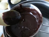 Take the biscuit by the tip and soak the top part...