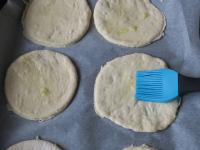 Put the wheels on a baking sheet lined with baking...