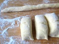 ... and cut in 4 pieces. Shape each piece into a...