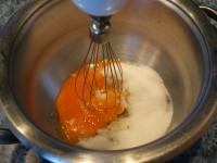 Whisk the egg yolks and sugar into foam....