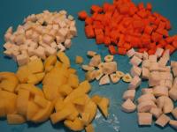 Clean the vegetables, wash and cut into small...