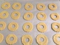 Put the cream puffs on a baking sheet lined with...