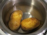 Wash the potatoes, cook them almost soft. Cool and...