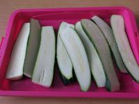 Wash three smaller zucchini and cut each into...