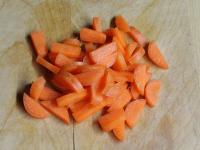 Clean the carrots and cut them....