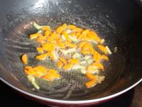 Fry the ginger with carrots in oil for about 5...