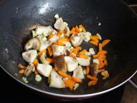 Add mushrooms and garlic to the pan. Season, salt...
