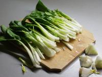 Cut the cabbage lengthwise and cut the hard parts...