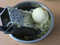 Peel the apples and grate roughly....