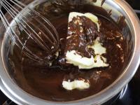 Break the chocolate into pieces and melt it...