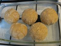 Put the balls in a baking dish with a little oil...