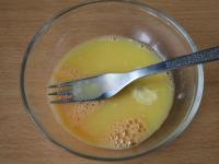Whip the eggs and add the lightly cooled butter...