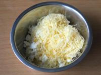 Add gouda cheese to Balkan cheese, 3/4 egg with...