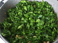Put spinach on the meat and add a cleaned,...