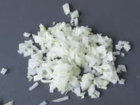 Peel the onion and cut it finely....