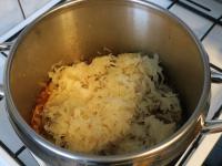 Add the cabbage to the meat....