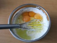 Add cream and eggs. Mix....