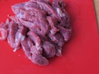 Wash the meat and cut into slices....
