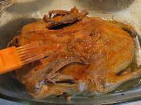 Take the duck with the baking dish out and...
