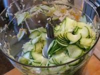 Grate the cucumber into a thin slices....